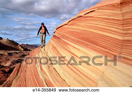Stock Photo - Hiking. The Wave", Coyote Buttes, Paria wilderness. Arizona. USA. ". Fotosearch