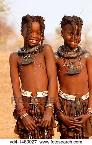 Himba boys brothers, with the typical plait hairstyle, Kaokoland, Kunene region, Namibia View Large Photo Image Stock Photo - Himba boys brothers, with the typical plait hairstyle, Kaokoland, Kunene region, Namibia. Fotosearch