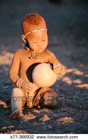 Himba child with pumpkin. Kaokoveld. Namibia. View Large Photo Image Stock Image - Himba child with pumpkin. Kaokoveld. Namibia.. Fotosearch