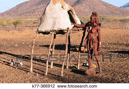Himba wife at the store room. Kaokoveld. Namibia. View Large Photo Image Stock Image - Himba wife at the store room. Kaokoveld. Namibia.. Fotosearch