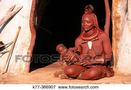 Himba wife with baby. Kaokoveld. Namibia. View Large Photo Image Stock Photo - Himba wife with baby. Kaokoveld. Namibia.. Fotosearch