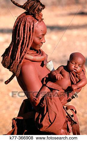 Himba wife with baby. Kaokoveld. Namibia. View Large Photo Image Stock Photo - Himba wife with baby. Kaokoveld. Namibia.. Fotosearch