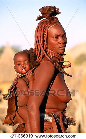 Himba wife with baby. Kaokoveld. Namibia. View Large Photo Image Stock Photo - Himba wife with baby. Kaokoveld. Namibia.. Fotosearch