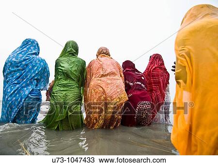 Hindu pilgrims bathing in the holy water of Gangasagar island during the annual mela. View Large Photo Image Stock Image - Hindu pilgrims bathing in the holy water of Gangasagar island during the annual mela.. Fotosearch