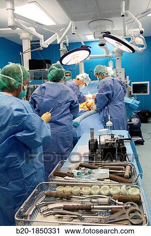 Stock Image - Hip replacement surgery, Orthopedics and Trauma surgery, Surgeon, Operating Theatre, Donostia Hospital, San Sebastian, Donostia, Gipuzkoa, Basque Country, Spain. Fotosearch