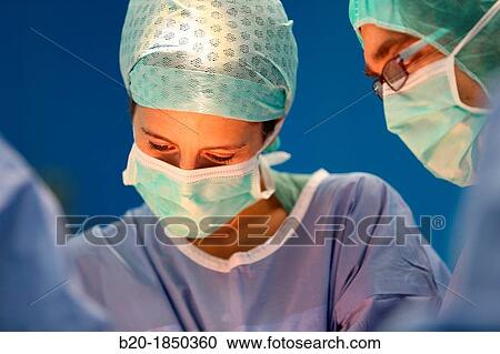 Stock Image - Hip replacement surgery, Orthopedics and Trauma surgery, Surgeon, Operating Theatre, Donostia Hospital, San Sebastian, Donostia, Gipuzkoa, Basque Country, Spain. Fotosearch