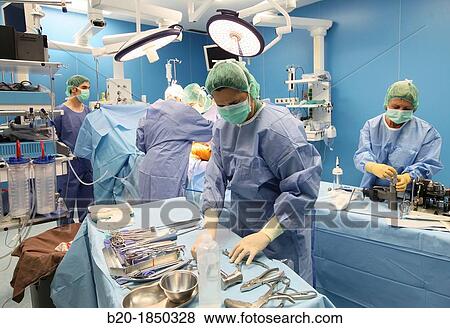 Stock Photo - Hip replacement surgery, Orthopedics and Trauma surgery, Surgeon, Operating Theatre, Donostia Hospital, San Sebastian, Donostia, Gipuzkoa, Basque Country, Spain. Fotosearch