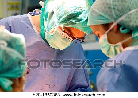 Stock Photo - Hip replacement surgery, Orthopedics and Trauma surgery, Surgeon, Operating Theatre, Donostia Hospital, San Sebastian, Donostia, Gipuzkoa, Basque Country, Spain. Fotosearch