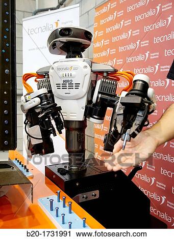 Hiro Japanese robot, humanoid robot working alongside people, Industrial Robotics, Research in Industrial Systems, R & D + i, Tecnalia Research and Innovation, Donostia, San Sebastian, Gipuzkoa, Basque Country, Spain View Large Photo Image Stock Image - Hiro Japanese robot, humanoid robot working alongside people, Industrial Robotics, Research in Industrial Systems, R & D + i, Tecnalia Research and Innovation, Donostia, San Sebastian, Gipuzkoa, Basque Country, Spain. Fotosearch