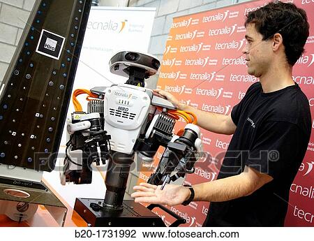Stock Image - Hiro Japanese robot, humanoid robot working alongside people, Industrial Robotics, Research in Industrial Systems, R & D + i, Tecnalia Research and Innovation, Donostia, San Sebastian, Gipuzkoa, Basque Country, Spain. Fotosearch
