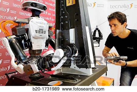 Hiro Japanese robot, humanoid robot working alongside people, Industrial Robotics, Research in Industrial Systems, R & D + i, Tecnalia Research and Innovation, Donostia, San Sebastian, Gipuzkoa, Basque Country, Spain View Large Photo Image Stock Photo - Hiro Japanese robot, humanoid robot working alongside people, Industrial Robotics, Research in Industrial Systems, R & D + i, Tecnalia Research and Innovation, Donostia, San Sebastian, Gipuzkoa, Basque Country, Spain. Fotosearch