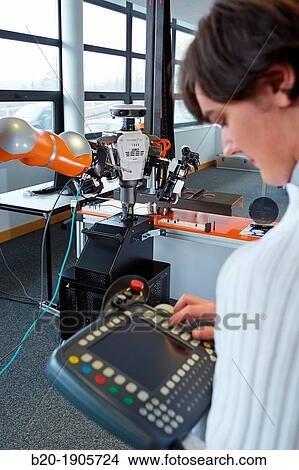 Picture - HIRO robot, Humanoid robot for automotive assembly tasks in collaboration with people and and LWR robot, using haptic teleoperation with force feedback. Fotosearch