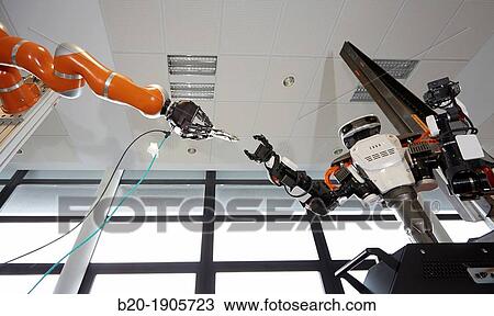 HIRO robot, Humanoid robot for automotive assembly tasks in collaboration with people and and LWR robot, using haptic teleoperation with force feedback View Large Photo Image Stock Image - HIRO robot, Humanoid robot for automotive assembly tasks in collaboration with people and and LWR robot, using haptic teleoperation with force feedback. Fotosearch