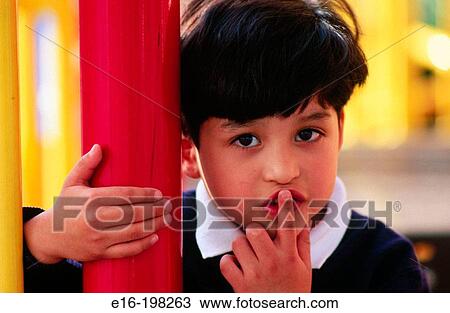 Hispanic boy on playground bars View Large Photo Image Stock Image - Hispanic boy on playground bars. Fotosearch