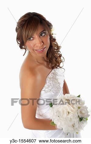 Hispanic bride with bridal flower bouquet View Large Photo Image Stock Photo - Hispanic bride with bridal flower bouquet. Fotosearch