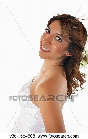 Stock Photo - Hispanic bride with bridal flower bouquet. Fotosearch