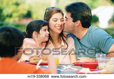 Hispanic family at lunch/picnic View Large Photo Image Stock Photo - Hispanic family at lunch/picnic. Fotosearch