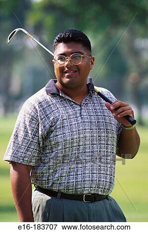 Hispanic golfer View Large Photo Image Stock Photo - Hispanic golfer. Fotosearch