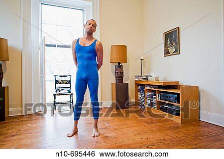 Hispanic man posing in his living room. View Large Photo Image Stock Photograph - Hispanic man posing in his living room.. Fotosearch