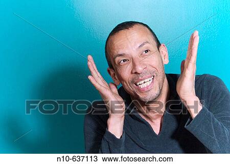 Hispanic man posing. View Large Photo Image Stock Image - Hispanic man posing.. Fotosearch