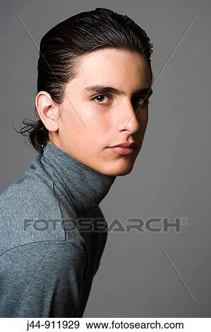 Hispanic teenage boy 16-17, portrait View Large Photo Image Stock Photo - Hispanic teenage boy 16-17, portrait. Fotosearch