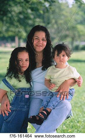 Picture - Hispanic woman and children. Fotosearch