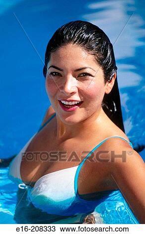 Hispanic woman in swimming pool View Large Photo Image Stock Image - Hispanic woman in swimming pool. Fotosearch