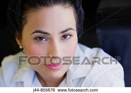Stock Photograph - Hispanic woman, portrait. Fotosearch