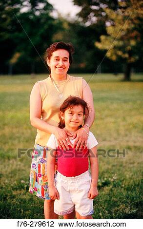 Hispanic woman with daughter View Large Photo Image Stock Image - Hispanic woman with daughter. Fotosearch