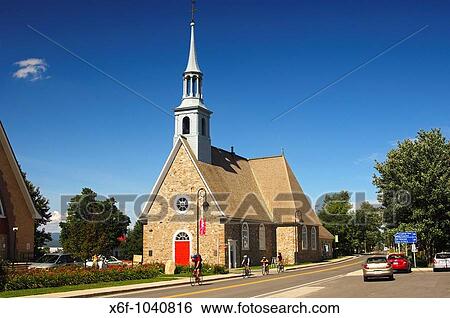 Stock Photograph - Historic momument Saint-Pierre-et-Saint-Paul Church in the municipality St-Pierre-de-l? Ile-d? Orleans on Orl? ans Island, Province of Quebec, Canada. Fotosearch