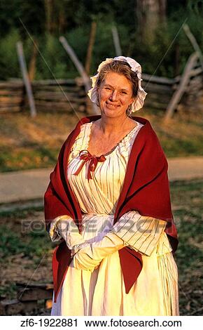 Historical Colonial America in Williamsburg Virginia with female actors in costume acting out history View Large Photo Image Stock Image - Historical Colonial America in Williamsburg Virginia with female actors in costume acting out history. Fotosearch
