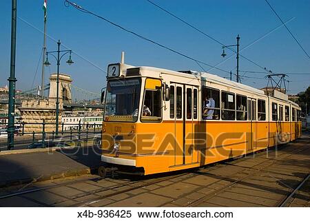 Historical tram line 2 moves along the Danube River in central Budapest Hungary Europe View Large Photo Image Stock Photography - Historical tram line 2 moves along the Danube River in central Budapest Hungary Europe. Fotosearch