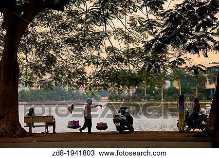 Stock Image - hoan kiem lake in hanoi. vietnam. Fotosearch