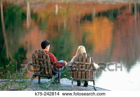 Holding hands on the dock View Large Photo Image Picture - Holding hands on the dock. Fotosearch
