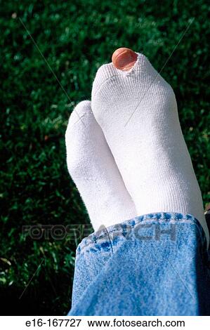 Hole in socks View Large Photo Image Stock Photo - Hole in socks. Fotosearch
