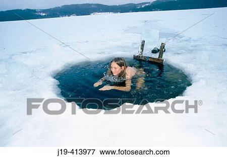 Hole in the ice, having a cold bath after the sauna. J? mtland, Sweden View Large Photo Image Stock Photo - Hole in the ice, having a cold bath after the sauna. J? mtland, Sweden. Fotosearch
