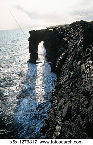 Holei sea arch in Volcanoes National Park on the Big Island of Hawaii, USA View Large Photo Image Stock Photo - Holei sea arch in Volcanoes National Park on the Big Island of Hawaii, USA. Fotosearch