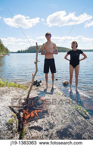 Holiday at summer cottage, family and relatives North of Sweden View Large Photo Image Stock Image - Holiday at summer cottage, family and relatives North of Sweden. Fotosearch