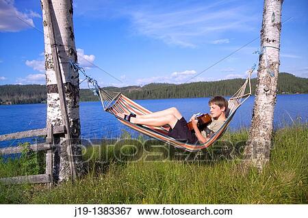 Holiday at summer cottage, family and relatives North of Sweden View Large Photo Image Stock Photo - Holiday at summer cottage, family and relatives North of Sweden. Fotosearch