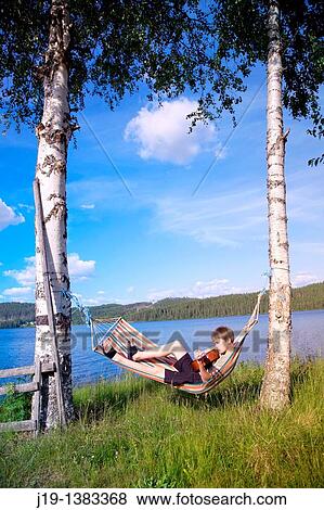 Holiday at summer cottage, family and relatives North of Sweden View Large Photo Image Stock Photo - Holiday at summer cottage, family and relatives North of Sweden. Fotosearch