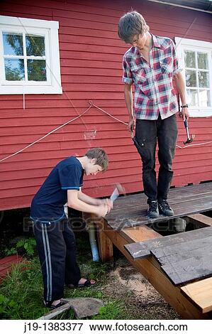 Holiday at summer cottage, family and relatives North of Sweden View Large Photo Image Stock Photo - Holiday at summer cottage, family and relatives North of Sweden. Fotosearch