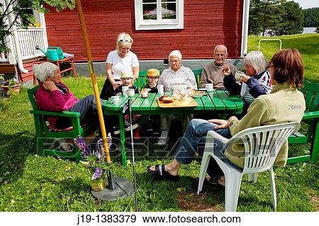 Holiday at summer cottage, family and relatives North of Sweden View Large Photo Image Stock Photo - Holiday at summer cottage, family and relatives North of Sweden. Fotosearch