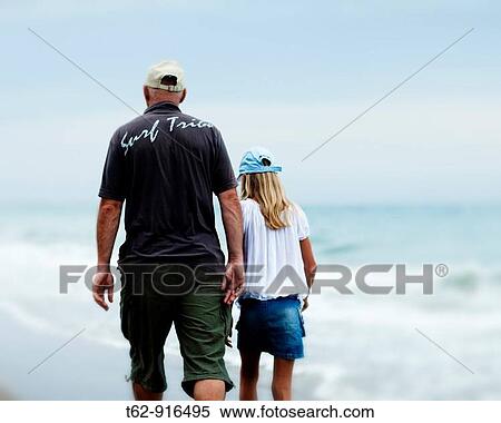 Holiday Walk along the beach to the sea View Large Photo Image Stock Photography - Holiday Walk along the beach to the sea. Fotosearch
