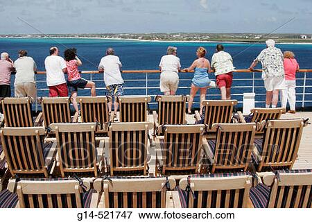 Holland America Line, ms Noordam, passengers, rail, chairs. Cockburn Town. Turks Island Passage. Grand Turk. Turks and Caicos. View Large Photo Image Stock Photo - Holland America Line, ms Noordam, passengers, rail, chairs. Cockburn Town. Turks Island Passage. Grand Turk. Turks and Caicos.. Fotosearch