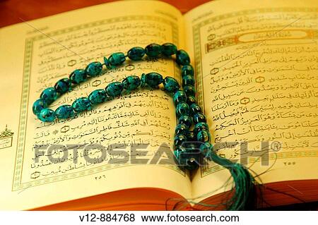 Holy Koran book View Large Photo Image Stock Photo - Holy Koran book. Fotosearch