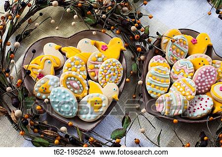 Picture - Home baking cookies made by mom for their children.. Fotosearch