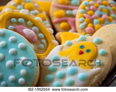Home baking cookies made by mom for their children. Foreground. View Large Photo Image Picture - Home baking cookies made by mom for their children. Foreground.. Fotosearch
