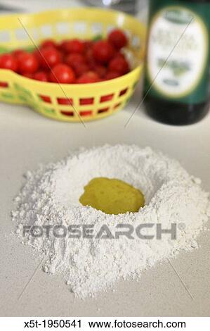 Stock Image - home made Cheese Focaccia flour and olive oil.. Fotosearch