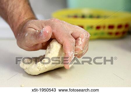 home made Cheese Focaccia kneading the dough. View Large Photo Image Stock Image - home made Cheese Focaccia kneading the dough.. Fotosearch