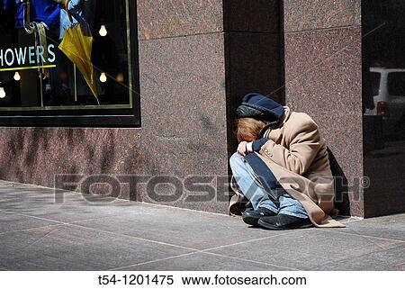 Homeless man sleeping on a corner in Manhattan View Large Photo Image Stock Photography - Homeless man sleeping on a corner in Manhattan. Fotosearch